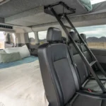 The upper bed can be accessed via an interior ladder. 