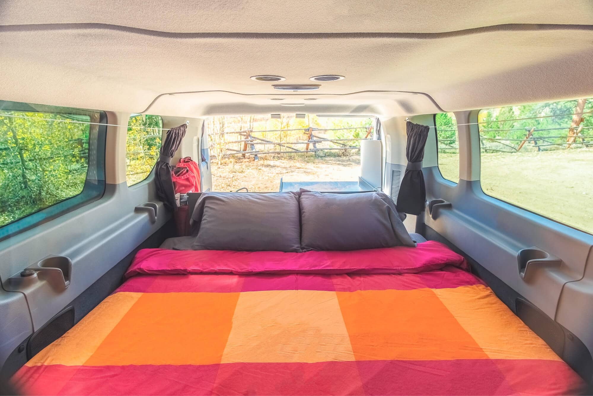 Escape Camper Vans come with a queen-sized bed.