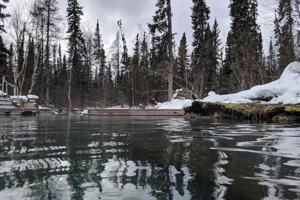 A hot spring in the winter time. 