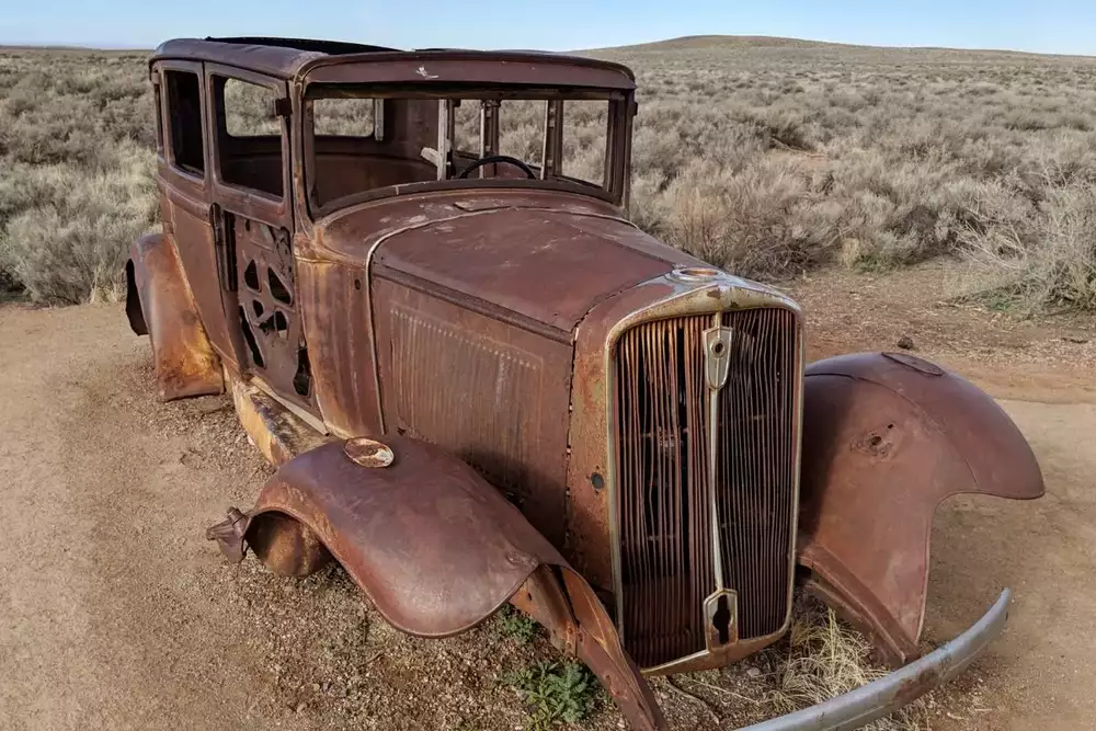 A rusted car in Petrified Forest National Park.